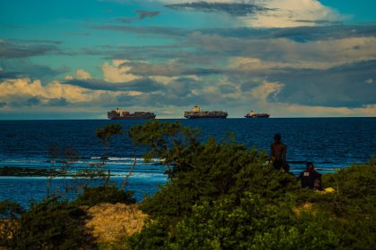 Container ships at a busy port