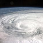 A hurricane's spiral cloud system photographed from the International Space Station