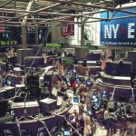 Traders at work on the floor of the New York Stock Exchange