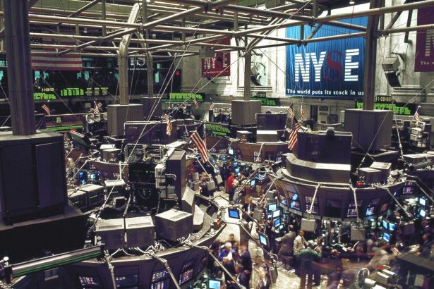 Traders at work on the floor of the New York Stock Exchange