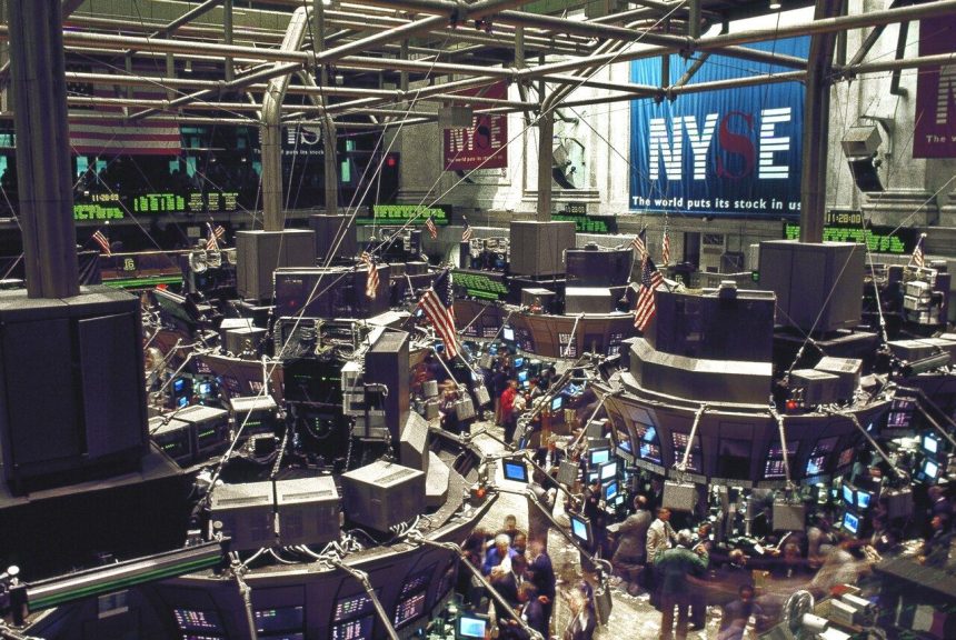 Traders at work on the floor of the New York Stock Exchange